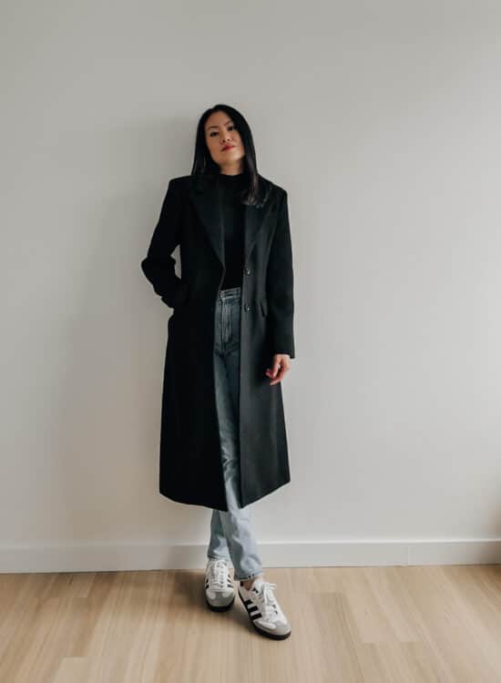 Elaine Le wears wool structured coat by Mango, Aritzia mockneck top, straight leg jeans from Abercrombie and Adidas Sambas OG.