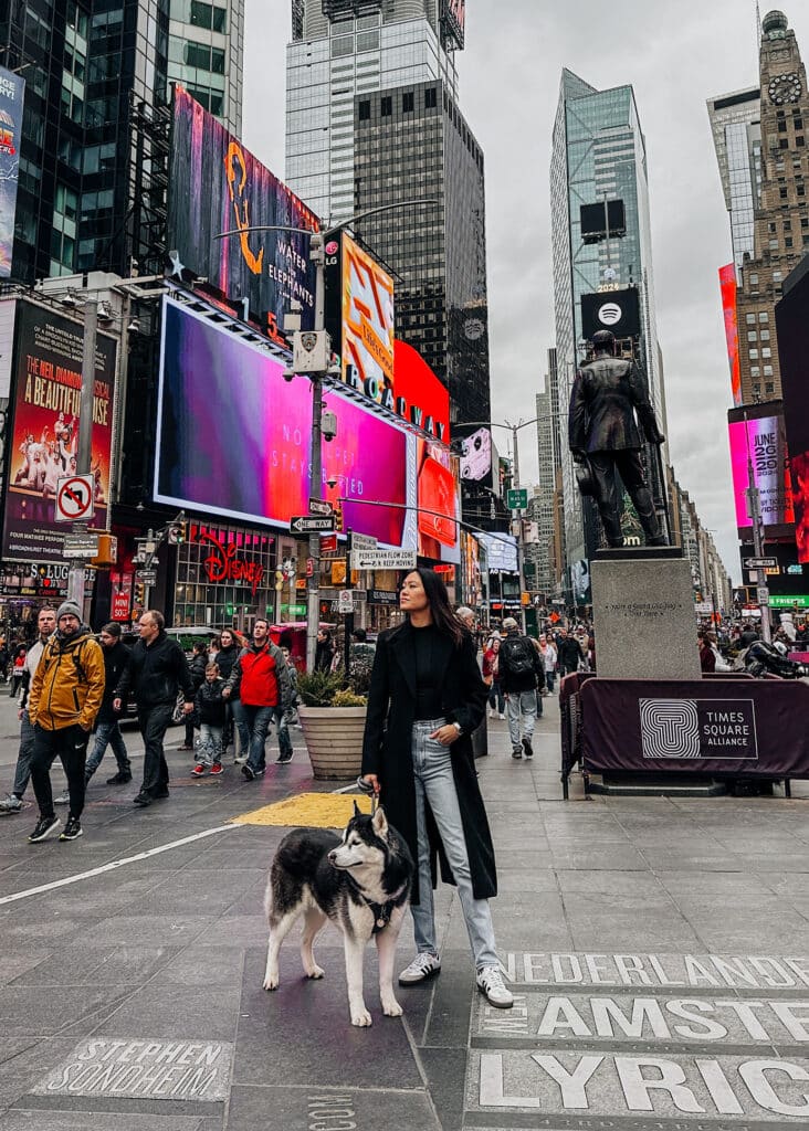 Elaine Le and Gatsby at Times Square New York City.